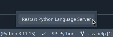 Spyder showing code completion status bar item with option to restart